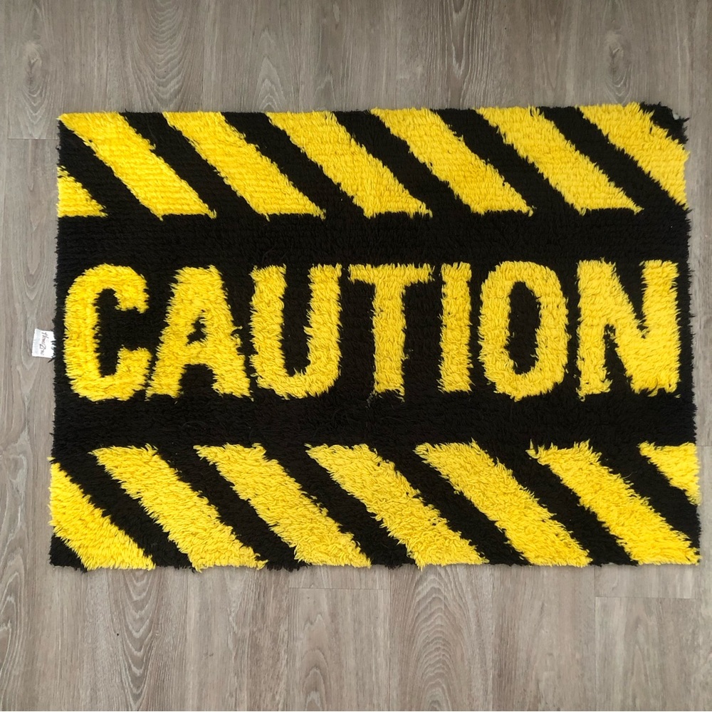 Caution homezone rug